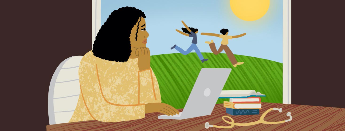 Woman inside studying on a laptop with books and a stethoscope. She looks longingly at a couple of people frolicking in the grass on a sunny day. She's experiencing FOMO.